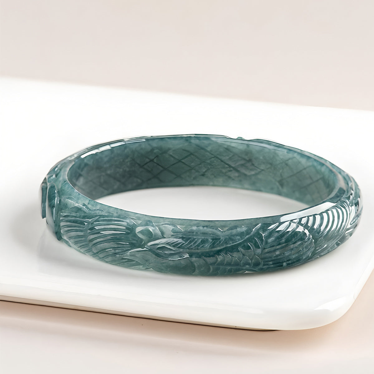 Carved natural Burmese jadeite bracelet