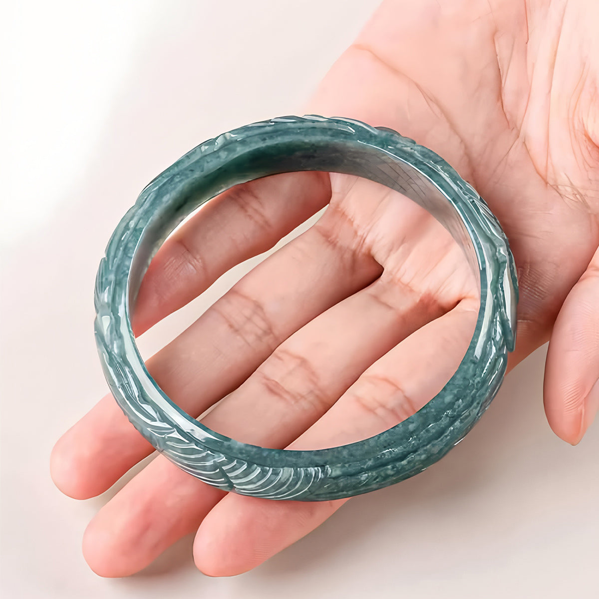 Carved natural Burmese jadeite bracelet