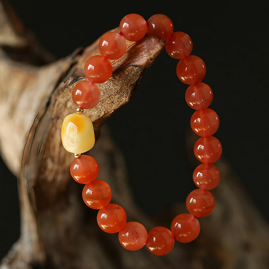 Natural red jade and beeswax beaded bracelet